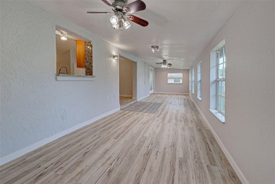 Welcome to this beautifully updated home featuring 3 bedrooms on Jacaranda West Country Club in Florida - for sale on GolfHomes.com, golf home, golf lot