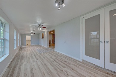 Welcome to this beautifully updated home featuring 3 bedrooms on Jacaranda West Country Club in Florida - for sale on GolfHomes.com, golf home, golf lot