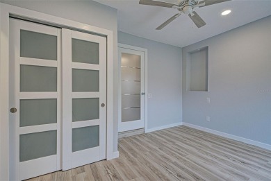 Welcome to this beautifully updated home featuring 3 bedrooms on Jacaranda West Country Club in Florida - for sale on GolfHomes.com, golf home, golf lot