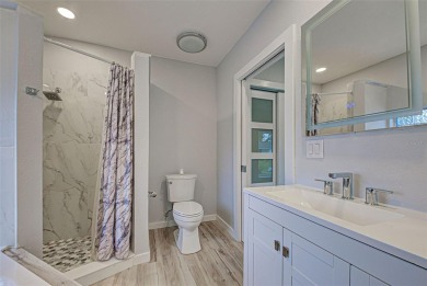 Welcome to this beautifully updated home featuring 3 bedrooms on Jacaranda West Country Club in Florida - for sale on GolfHomes.com, golf home, golf lot