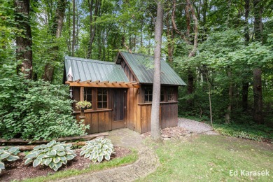 Discover 6127 Kings Way in The Ravines, an Arnold Palmer on Ravines Golf Club in Michigan - for sale on GolfHomes.com, golf home, golf lot