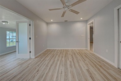 Welcome to this beautifully updated home featuring 3 bedrooms on Jacaranda West Country Club in Florida - for sale on GolfHomes.com, golf home, golf lot