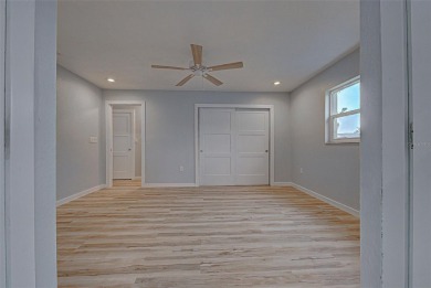 Welcome to this beautifully updated home featuring 3 bedrooms on Jacaranda West Country Club in Florida - for sale on GolfHomes.com, golf home, golf lot