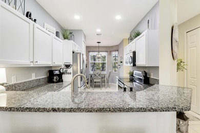 ENJOY GOLF VIEWS FROM THIS NICELY UPDATED TOWNHOUSE IN THE on The Legacy Golf and Tennis Club in Florida - for sale on GolfHomes.com, golf home, golf lot