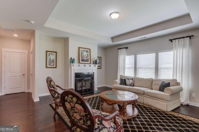 Located in the highly sought-after Traditions of Braselton, this on Traditions of Braselton Golf Club in Georgia - for sale on GolfHomes.com, golf home, golf lot