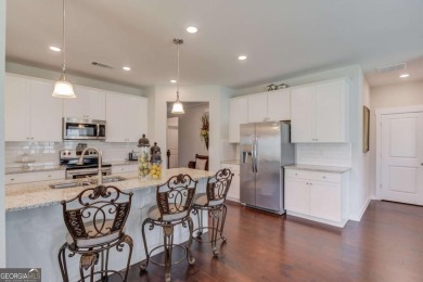 Located in the highly sought-after Traditions of Braselton, this on Traditions of Braselton Golf Club in Georgia - for sale on GolfHomes.com, golf home, golf lot
