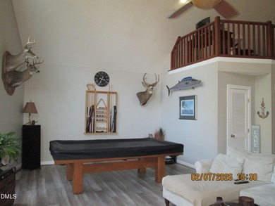 A must-see home in Lake Royale. This beautiful A Frame home on River Golf and Country Club at Lake Royale in North Carolina - for sale on GolfHomes.com, golf home, golf lot