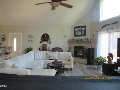 A must-see home in Lake Royale. This beautiful A Frame home on River Golf and Country Club at Lake Royale in North Carolina - for sale on GolfHomes.com, golf home, golf lot