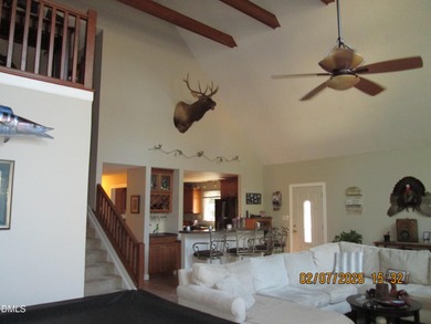 A must-see home in Lake Royale. This beautiful A Frame home on River Golf and Country Club at Lake Royale in North Carolina - for sale on GolfHomes.com, golf home, golf lot