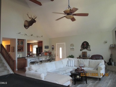 A must-see home in Lake Royale. This beautiful A Frame home on River Golf and Country Club at Lake Royale in North Carolina - for sale on GolfHomes.com, golf home, golf lot