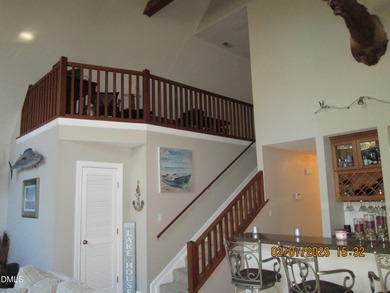 A must-see home in Lake Royale. This beautiful A Frame home on River Golf and Country Club at Lake Royale in North Carolina - for sale on GolfHomes.com, golf home, golf lot