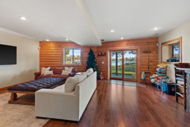 Lakefront Log Home – Private Beach & Docks on Lake Camelot on Sand Valley Golf Course in Wisconsin - for sale on GolfHomes.com, golf home, golf lot
