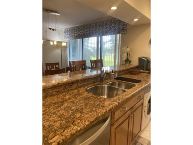 Gorgeous bright and sunny villa with amazing  panoramic views of on PGA National Golf Club in Florida - for sale on GolfHomes.com, golf home, golf lot