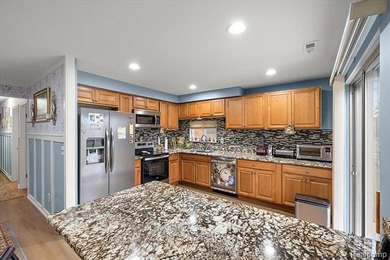 Welcome to this beautifully updated brick ranch condo, ideally on Maple Lane Golf Club in Michigan - for sale on GolfHomes.com, golf home, golf lot