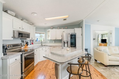 Clean inspection in hand and priced to sell! Welcome to your on Barefoot Bay Golf Course in Florida - for sale on GolfHomes.com, golf home, golf lot