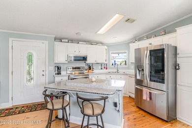 Clean inspection in hand and priced to sell! Welcome to your on Barefoot Bay Golf Course in Florida - for sale on GolfHomes.com, golf home, golf lot