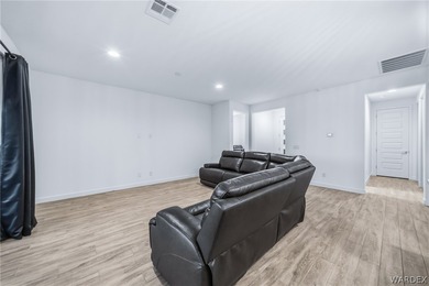 Experience elevated desert luxury in the prestigious Laughlin on Laughlin Ranch Golf Club in Arizona - for sale on GolfHomes.com, golf home, golf lot