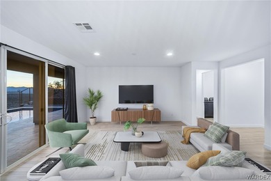 Experience elevated desert luxury in the prestigious Laughlin on Laughlin Ranch Golf Club in Arizona - for sale on GolfHomes.com, golf home, golf lot