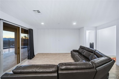 Experience elevated desert luxury in the prestigious Laughlin on Laughlin Ranch Golf Club in Arizona - for sale on GolfHomes.com, golf home, golf lot