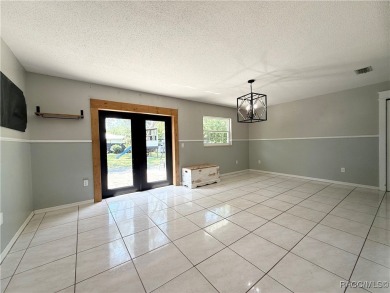 Unlock the potential in this nearly finished 4-bedroom, 2.5-bath on Citrus Springs Country Club in Florida - for sale on GolfHomes.com, golf home, golf lot