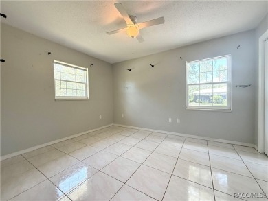 Unlock the potential in this nearly finished 4-bedroom, 2.5-bath on Citrus Springs Country Club in Florida - for sale on GolfHomes.com, golf home, golf lot