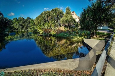 Welcome to your beautiful private sanctuary in Cobbler's Village on Jacaranda Golf Club in Florida - for sale on GolfHomes.com, golf home, golf lot