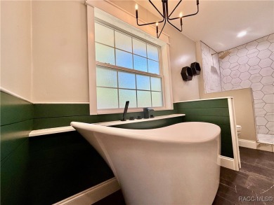 Unlock the potential in this nearly finished 4-bedroom, 2.5-bath on Citrus Springs Country Club in Florida - for sale on GolfHomes.com, golf home, golf lot