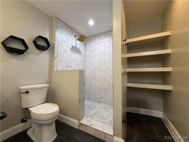 Unlock the potential in this nearly finished 4-bedroom, 2.5-bath on Citrus Springs Country Club in Florida - for sale on GolfHomes.com, golf home, golf lot