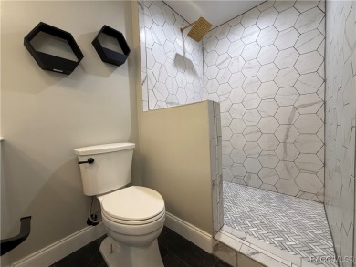 Unlock the potential in this nearly finished 4-bedroom, 2.5-bath on Citrus Springs Country Club in Florida - for sale on GolfHomes.com, golf home, golf lot