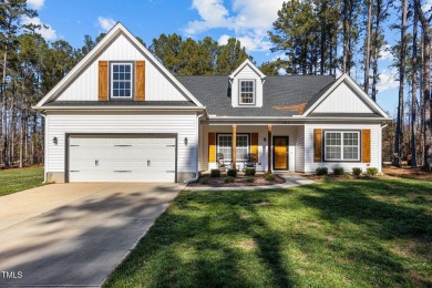 One of a kind ranch sitting on a double lot in a desirable gated on River Golf and County Club at Lake Royale in North Carolina - for sale on GolfHomes.com, golf home, golf lot