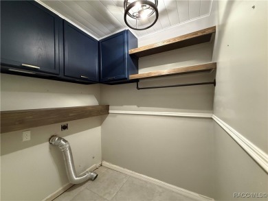 Unlock the potential in this nearly finished 4-bedroom, 2.5-bath on Citrus Springs Country Club in Florida - for sale on GolfHomes.com, golf home, golf lot