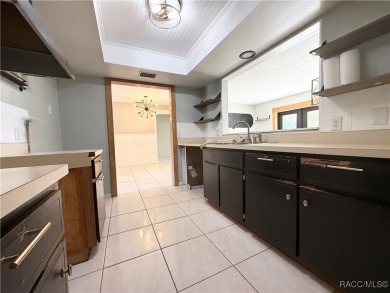 Unlock the potential in this nearly finished 4-bedroom, 2.5-bath on Citrus Springs Country Club in Florida - for sale on GolfHomes.com, golf home, golf lot