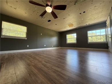 Unlock the potential in this nearly finished 4-bedroom, 2.5-bath on Citrus Springs Country Club in Florida - for sale on GolfHomes.com, golf home, golf lot