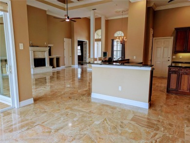 Biggest suggestion was to open up the kitchen, sellers heard you on Saint Andrews South Golf Club in Florida - for sale on GolfHomes.com, golf home, golf lot