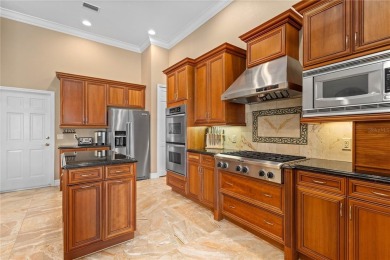 Biggest suggestion was to open up the kitchen, sellers heard you on Saint Andrews South Golf Club in Florida - for sale on GolfHomes.com, golf home, golf lot