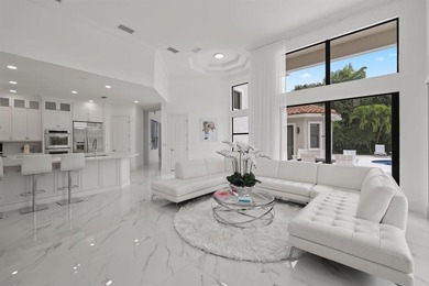 Model-perfect 5 bedroom, 4.5 bathroom w captivating views of the on Parkland Golf Club in Florida - for sale on GolfHomes.com, golf home, golf lot