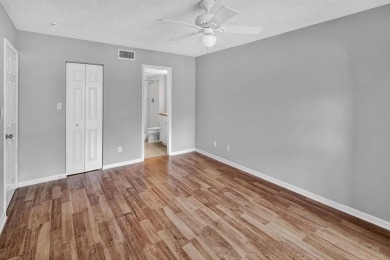 AVAILABLE NOW! UNFURNISHED 2ND FLOOR condo in gated & guarded on Feather Sound Country Club in Florida - for sale on GolfHomes.com, golf home, golf lot