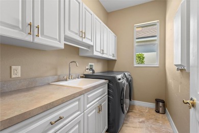 Biggest suggestion was to open up the kitchen, sellers heard you on Saint Andrews South Golf Club in Florida - for sale on GolfHomes.com, golf home, golf lot