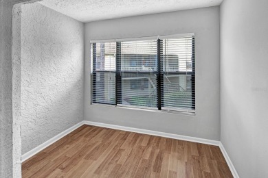 AVAILABLE NOW! UNFURNISHED 2ND FLOOR condo in gated & guarded on Feather Sound Country Club in Florida - for sale on GolfHomes.com, golf home, golf lot