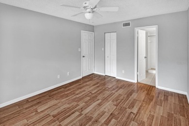 AVAILABLE NOW! UNFURNISHED 2ND FLOOR condo in gated & guarded on Feather Sound Country Club in Florida - for sale on GolfHomes.com, golf home, golf lot