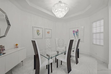 Model-perfect 5 bedroom, 4.5 bathroom w captivating views of the on Parkland Golf Club in Florida - for sale on GolfHomes.com, golf home, golf lot