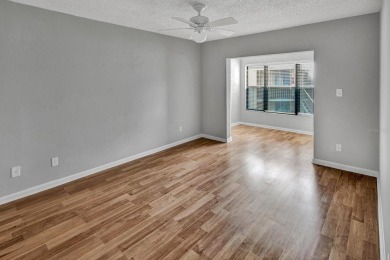 AVAILABLE NOW! UNFURNISHED 2ND FLOOR condo in gated & guarded on Feather Sound Country Club in Florida - for sale on GolfHomes.com, golf home, golf lot