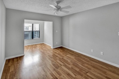 AVAILABLE NOW! UNFURNISHED 2ND FLOOR condo in gated & guarded on Feather Sound Country Club in Florida - for sale on GolfHomes.com, golf home, golf lot