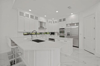 Model-perfect 5 bedroom, 4.5 bathroom w captivating views of the on Parkland Golf Club in Florida - for sale on GolfHomes.com, golf home, golf lot