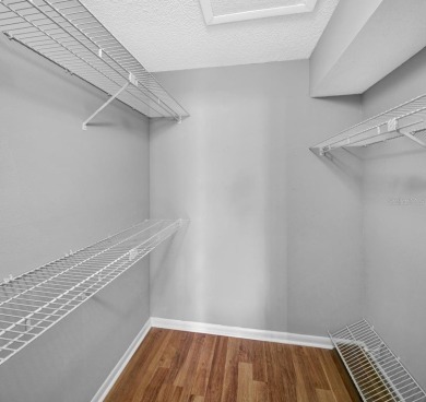 AVAILABLE NOW! UNFURNISHED 2ND FLOOR condo in gated & guarded on Feather Sound Country Club in Florida - for sale on GolfHomes.com, golf home, golf lot