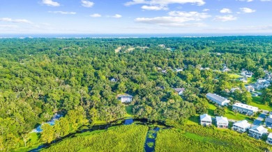 Welcome to 175 Chapel Creek Road - a stunning custom-built home on Willbrook Plantation Golf Club in South Carolina - for sale on GolfHomes.com, golf home, golf lot