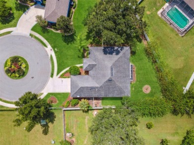 Discover the perfect blend of privacy, luxury, and community at on The Club at Eaglebrooke in Florida - for sale on GolfHomes.com, golf home, golf lot