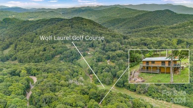 Nestled in Wolf Laurel, a 5,300-acre gated community surrounded on Wolf Laurel Country Club in North Carolina - for sale on GolfHomes.com, golf home, golf lot