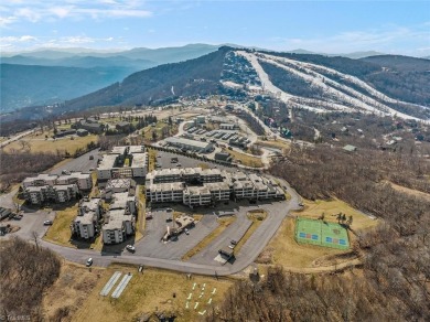 Enjoy ski slope views from this updated, turnkey two bedroom on Beech Mountain Club in North Carolina - for sale on GolfHomes.com, golf home, golf lot