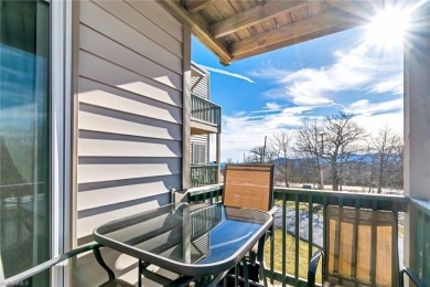 Enjoy ski slope views from this updated, turnkey two bedroom on Beech Mountain Club in North Carolina - for sale on GolfHomes.com, golf home, golf lot